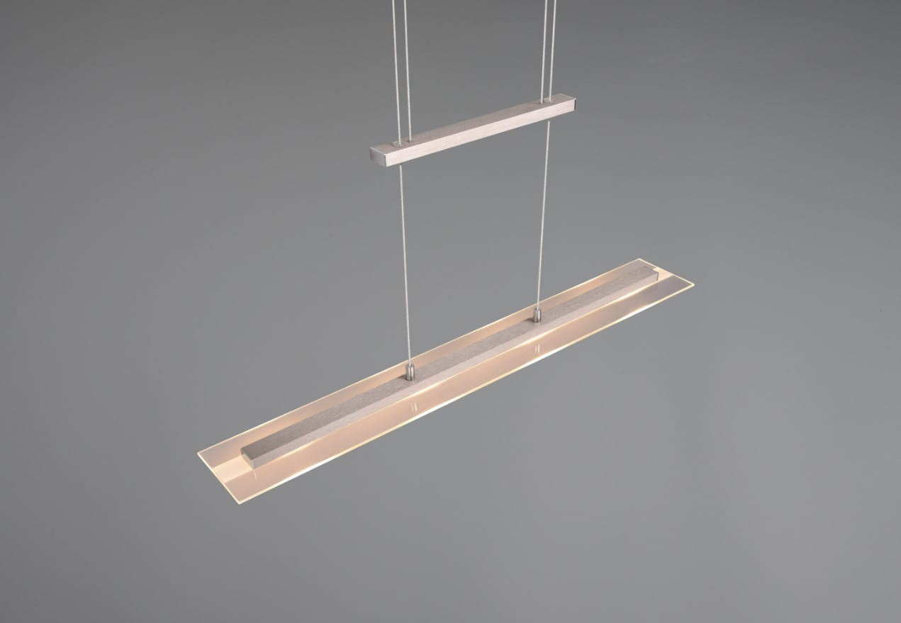 Lampa wisząca Milos w kolorze niklowym, z czterema diodami LED o mocy 20W. Posiada prostokątny kształt z metalowym elementem oraz przezroczystą osłoną. Zawieszona na cienkich linkach, prezentuje się nowocześnie na jednolitym tle.