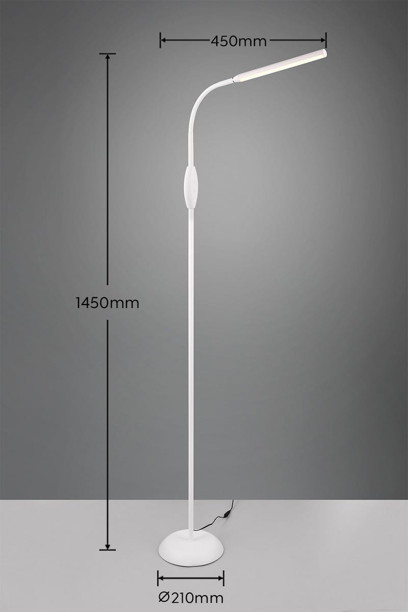 Biała lampa podłogowa Toro z jedną żarówką LED o mocy 5W. Posiada smukły, zakrzywiony kształt, z podstawą o średnicy 210 mm i wysokości 1450 mm. Ujęcie frontalne, na jednolitym tle, z widoczną wtyczką elektryczną.