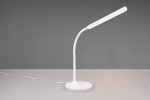 Lampa stołowa Toro w kolorze białym z elastycznym ramieniem i okrągłą podstawą. Ujęcie z boku, z widocznym przewodem zasilającym. Posiada wbudowany moduł LED o mocy 5W, idealna do biura lub do czytania.