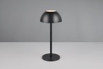 Czarna lampa stołowa zewnętrzna Ricardo z okrągłą podstawą i kloszem w kształcie półkuli. Posiada jedno źródło światła LED o mocy 1,5W. Ujęcie frontalne, lampa stoi na prostym tle.