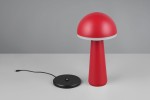 Czerwona lampa stołowa Fungo zewnętrzna, z kształtem grzyba. Posiada okrągłą, gładką głowicę i cylindryczną podstawę. W zestawie czarna podstawa z kablem. Wymiary i detale konstrukcyjne nie są podane.