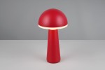 Czerwona lampa stołowa Fungo z zewnętrznym źródłem światła LED (2W) o kształcie grzyba. Posiada matową, okrągłą czaszę i stożkowaty korpus. Ustawiona na płaskiej powierzchni, o prostej, szarej tle.