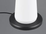 Lampa stołowa Fungo, zewnętrzna, z białym kloszem i czarną podstawą. Widok z boku, ukazujący kształt cylindryczny oraz kabel zasilający. Wykonana z materiałów odpornych na warunki atmosferyczne, przeznaczona do użytku na zewnątrz.