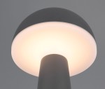Lampa stołowa Fungo w kolorze antracytowym z okrągłym kloszem, emitującym ciepłe światło. Ujęcie z góry, ukazujące gładki, matowy materiał oraz elegancki kształt. Idealna do użytku na zewnątrz, z jedną diodą LED o mocy 2W.