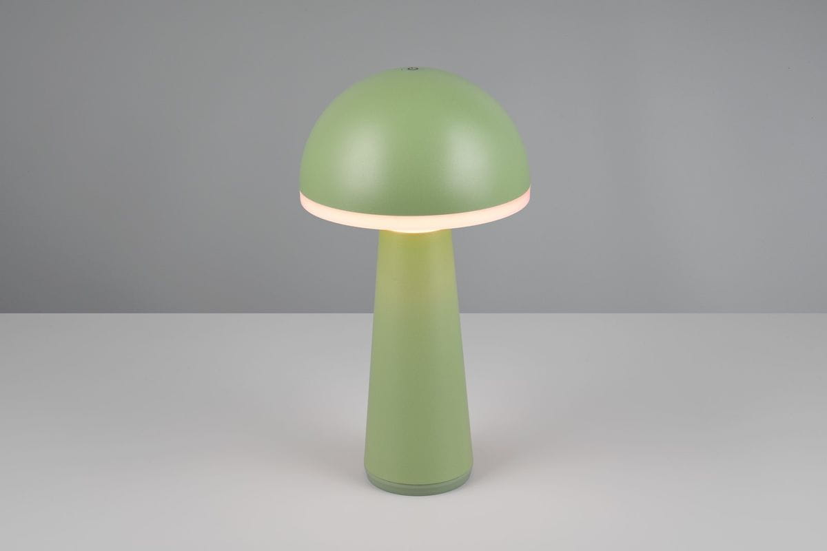 Lampa stołowa Fungo zewnętrzna w zielonym kolorze, z cylindrycznym korpusem i zaokrąglonym kloszem. Posiada diodę LED o mocy 2W. Ujęcie frontalne, produkt stoi na białym tle, ukazuje gładką fakturę i minimalistyczny design.