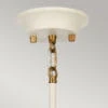 Lampa wisząca Cosmos w antycznej bieli z mosiężnymi elementami. Widoczna podsufitka z trzema punktami mocującymi oraz dekoracyjny kabel. Idealna do nowoczesnych i klasycznych wnętrz.