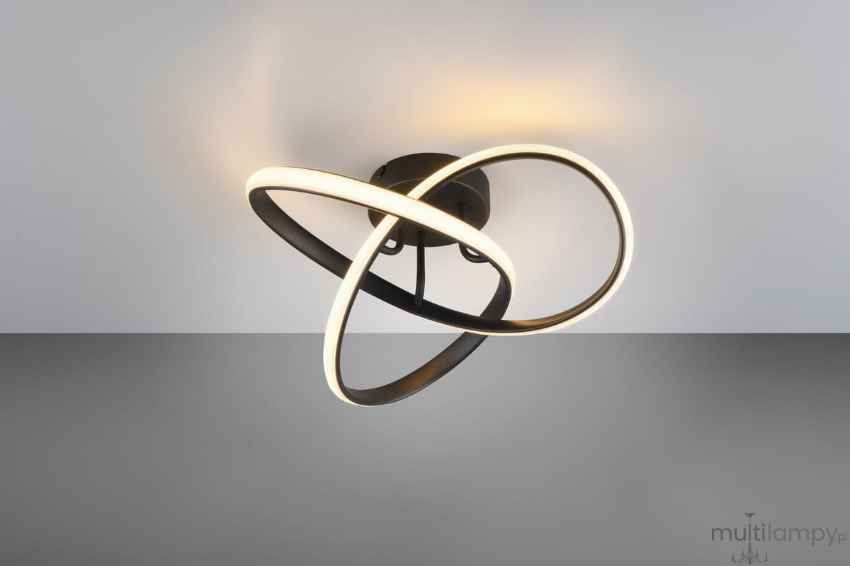 Lampa sufitowa Meo w kolorze czarnym z jedną diodą LED o mocy 15W i temperaturze barwowej 3000K. Posiada dwa okręgi w kształcie spirali, jeden z białym podświetleniem, montowana na suficie. Ujęcie z góry, na jednolitym tle.