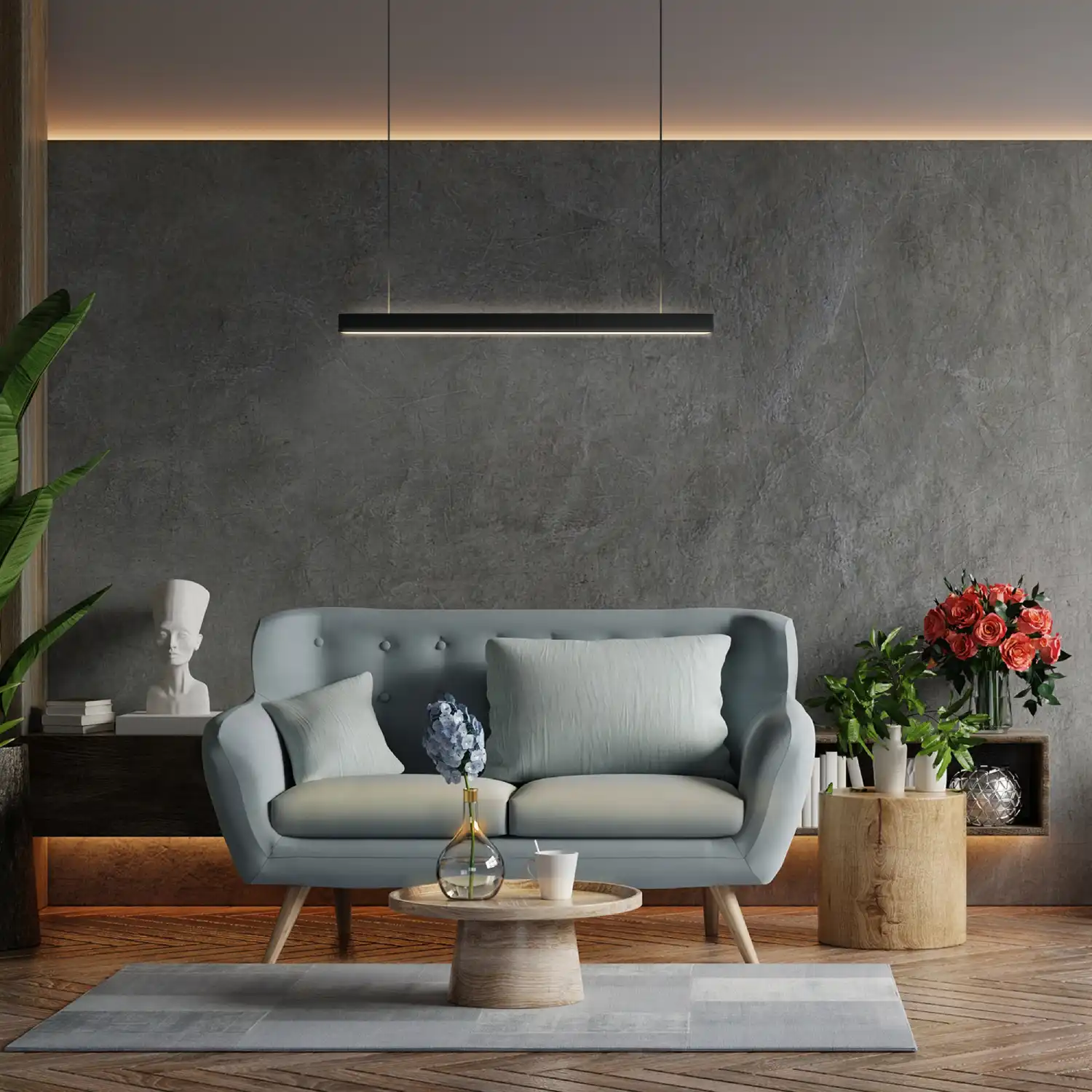 Lampa wisząca Sigi V w kolorze czarnym, z dwoma źródłami LED o mocy 45W i temperaturze barwowej 3000K. Zamontowana nad sofą, w nowoczesnym wnętrzu z szarymi ścianami i drewnianą podłogą.