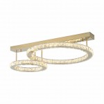 Lampa sufitowa Girona 2xLED/36W w kolorze złotym, z dwoma pierścieniami oświetleniowymi, umieszczonymi na prostokątnej podstawie. Pierścienie zdobione są przezroczystymi elementami, co tworzy efektowną iluminację. Zawieszona w górnej pozycji.