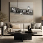 Lampa wisząca Mila w kolorze czarnym, z dziesięcioma źródłami światła G9. Posiada elegancką konstrukcję z przezroczystymi kulami, zawieszona nad ciemnym stołem w nowoczesnym wnętrzu z jasną sofą i dekoracjami.