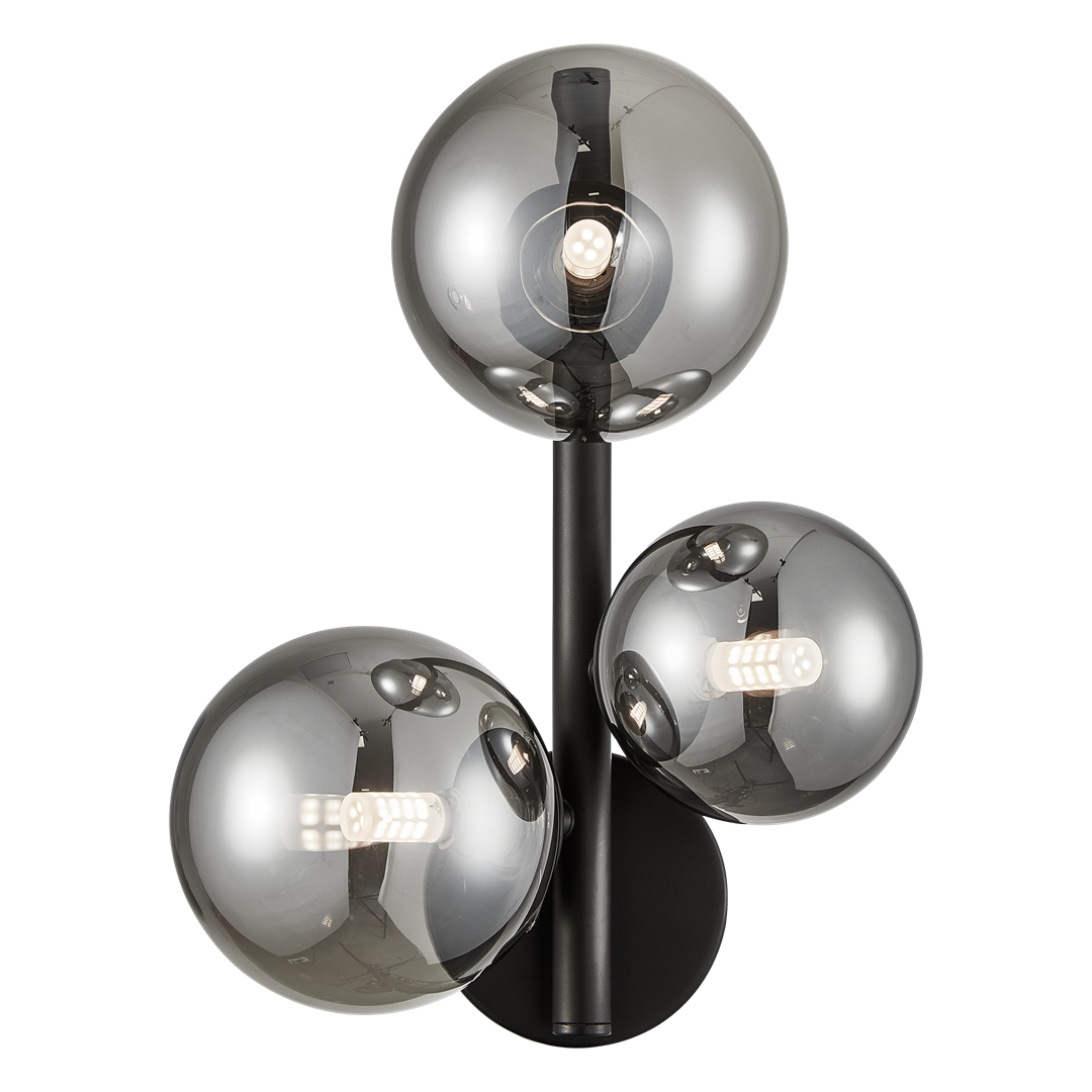 Mila kinkiet 3xG9 w kolorze czarnym, z trzema przezroczystymi kulami o metalicznym wykończeniu. Produkt zamontowany na okrągłej podstawie, widok z góry, ukazujący źródła światła w każdej z kul.