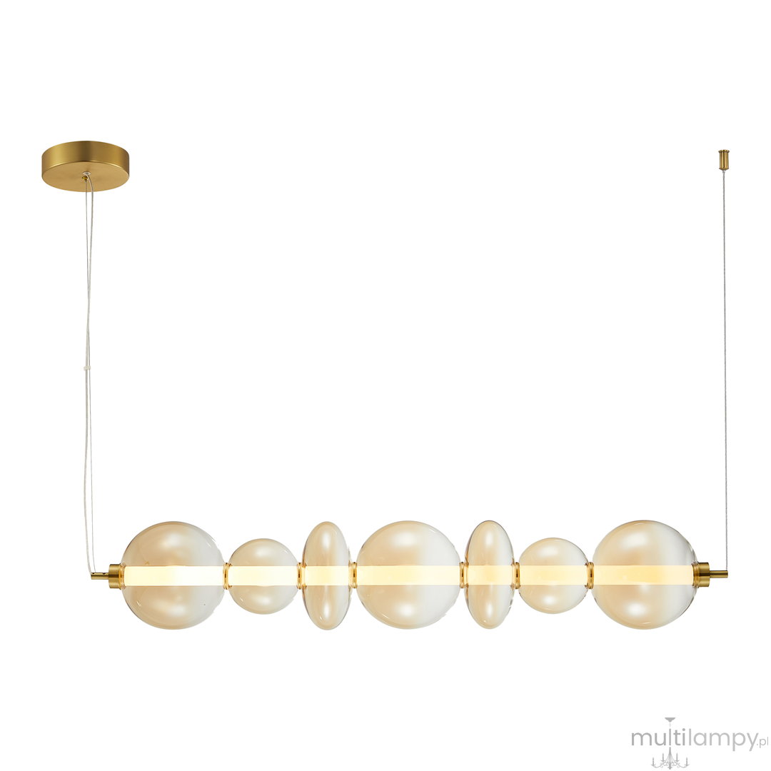 Lampa wisząca Daphne z 1xLED/40W, złota, z przezroczystymi kulami w różnych rozmiarach, zawieszona na cienkim kablu. Kształt owalny, minimalistyczny design, idealna do nowoczesnych wnętrz. Montaż sufitowy, prosta forma.