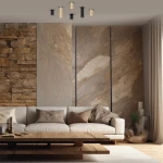 Czarna lampa sufitowa Genesis H10 z jednym gniazdem GU10, zawieszona na tle nowoczesnego wnętrza z kamienną ścianą. Lampa ma cylindryczny kształt, z metalicznymi elementami, podkreślając elegancki styl aranżacji.