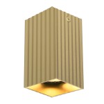 Lampa sufitowa Tecno 1xGU10 w kolorze złotym, o prostokątnym kształcie z pionowymi żłobieniami. Zawiera oprawę na żarówkę GU10, z widocznym źródłem światła w dolnej części. Ujęcie z boku, wisząca, na jednolitym tle.