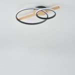 Lampa sufitowa Almeria 2xLED/17W w kolorze czarnym z elementem drewnianym. Składa się z dwóch okręgów w różnych rozmiarach, zawieszonych na prostokątnej listwie. Ujęcie z góry, na jasnym tle.