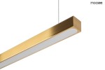 Lampa wisząca Linus 80, w kolorze złotym, z prostokątnym korpusem z matowego metalu. Posiada wbudowane źródło światła LED o mocy 15W. Zawieszona na cienkim przewodzie, z białą osłoną na spodniej stronie.