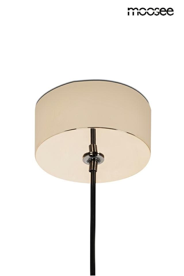 Lampa wisząca Ojo z pojedynczym źródłem LED 7W, w złotym kolorze. Posiada okrągły klosz z metalicznym wykończeniem, zawieszona na czarnym kablu. Widok z dołu, ukazujący detal mocowania oraz elegancką formę lampy.