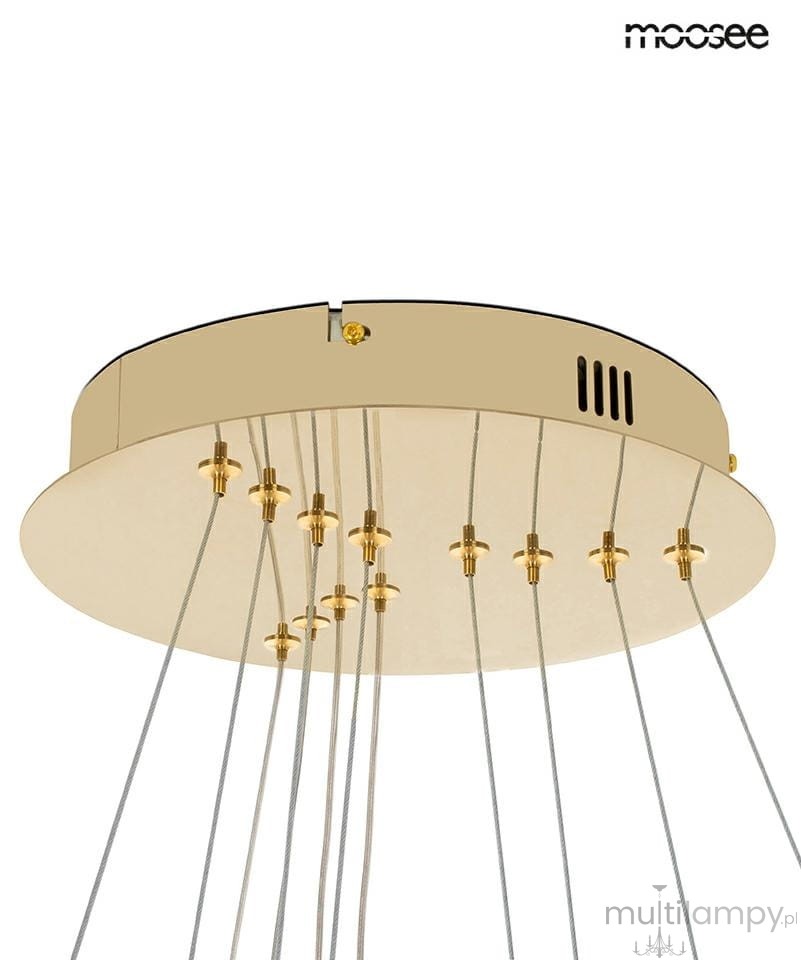 Lampa wisząca Ring Slim M w kolorze złotym, z pilotem, z oświetleniem LED. Posiada okrągłą podstawę z wieloma przewodami. Widoczna jest część konstrukcji z zamocowanymi łączeniami. Idealna do nowoczesnych wnętrz.