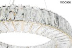 Lampa wisząca Allisia 80 z metalowym złotym stelażem, posiadająca 1xLED/43W. Wykonana z przezroczystego szkła, z dekoracyjnymi, diamentowymi elementami. Ujęcie z góry, pokazujące detale kryształów i ich błyszczące wykończenie.