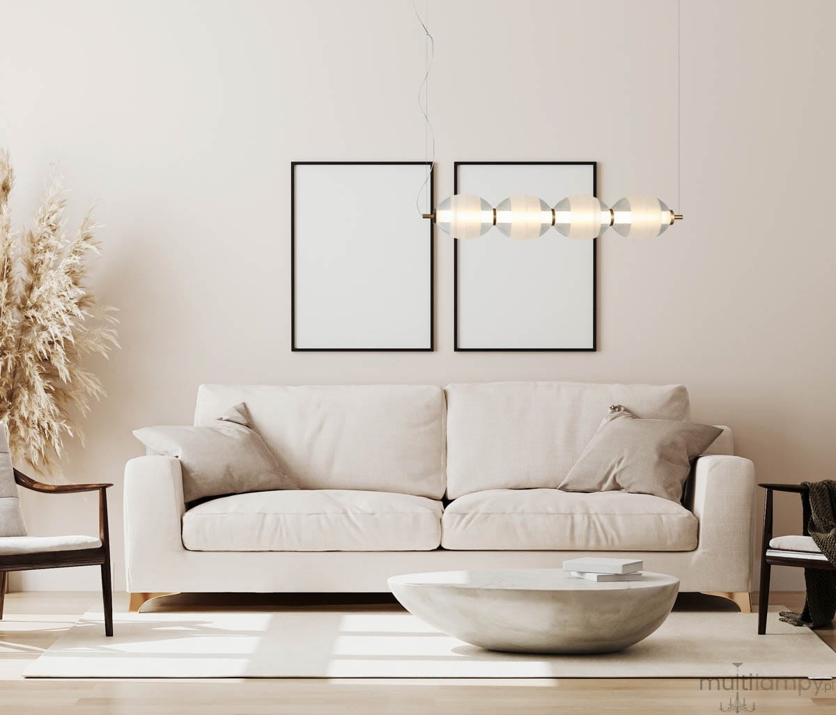 Lampa wisząca Rinot 1xLED/29W w kolorze czarnym, z sześcioma szklanymi kloszami, zawieszona nad jasną sofą w minimalistycznym wnętrzu. Tło w odcieniach beżu, z dekoracyjną roślinnością obok i pustymi ramkami na ścianie.
