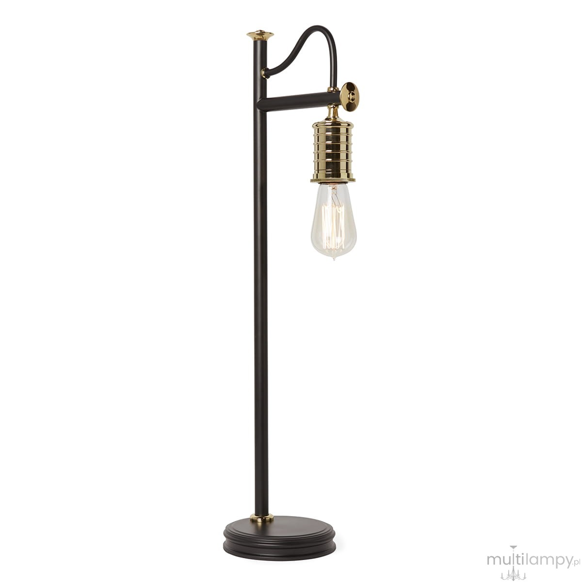 Czarna lampka stołowa z metalowym stelażem, jedna żarówka E27. Posiada złoty klosz w formie cylindrycznej, umieszczona na okrągłej podstawie. Ujęcie frontalne, produkt stoi na płaskiej powierzchni.