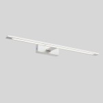 Kinkiet LED Isla IP44 w kolorze białym, o długości 62 cm i mocy 20W. Posiada prostokątną formę z cienką, podłużną oprawą, zamontowaną na kwadratowej podstawie. Oświetlenie rozproszone, idealne do łazienek lub innych wilgotnych pomieszczeń.