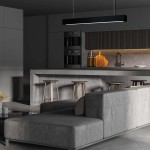 Lampa wisząca LED Ibros L93/24W/CCT w kolorze czarnym, prostokątna, zawieszona nad kuchennym blatem. Widoczna w nowoczesnym wnętrzu z szarymi meblami i drewnianymi taboretami, oświetlająca strefę roboczą.