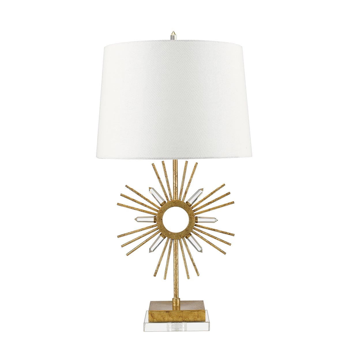 Lampka stołowa Sun King 1xE27 w kolorze starego złota z białym abażurem. Podstawa w kształcie promieni słonecznych z centralnym okręgiem, wykonana z metalu i akrylu. Ustawiona na prostokątnej podstawie.