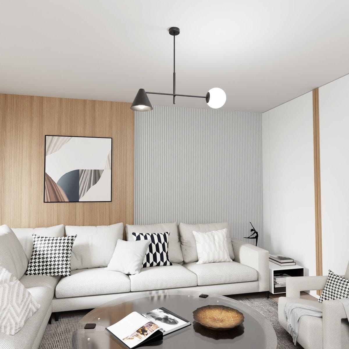 Lampa wisząca Hermes w kolorze czarnym z jednym kloszem E27 i jednym E14. Zawieszona na cienkim, czarnym przewodzie, z geometrycznym kloszem w kształcie stożka i okrągłą żarówką. Ujęcie z góry w nowoczesnym wnętrzu z jasnymi meblami.