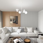 Lampa wisząca Hermes 2xE27+2xE14 w kolorze białym, z trzema asymetrycznymi kloszami w kształcie stożków i okrągłych kul, zawieszona w nowoczesnym wnętrzu z jasną kanapą i drewnianą ścianą.
