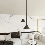 Lampa wisząca Elit 3xGX53 w kolorze czarnym, składająca się z trzech stożkowatych kloszy zwisających na cienkich linkach. Ujęcie z góry, w tle widoczna elegancka aranżacja wnętrza z jasnym sofą i marmurową ścianą.