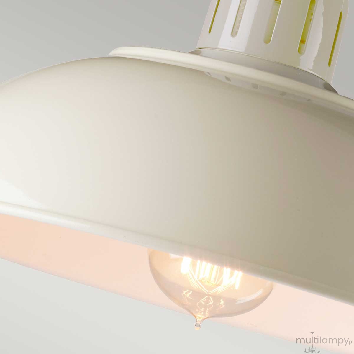 Kremowa lampka stołowa Franklin z kloszem w kształcie miski, z widoczną żarówką w kształcie bańki. Ujęcie z góry, ukazujące gładką, błyszczącą powierzchnię klosza i detal mocowania żarówki. Tło w jednolitym jasnym kolorze.