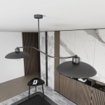 Lampa wisząca Foster 2xE27 w kolorze czarnym, z podwójnymi kloszami o zaokrąglonym kształcie. Zawieszona na smukłym ramieniu, umieszczona w nowoczesnym wnętrzu z marmurowymi i drewnianymi akcentami.