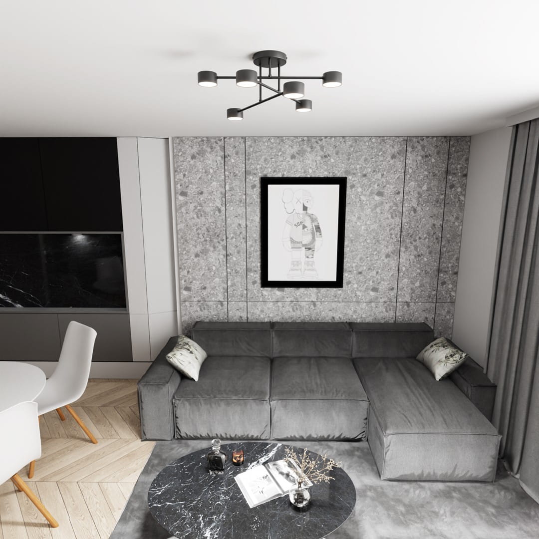 Lampa sufitowa Halo w kolorze czarnym z sześcioma źródłami światła GX53. Ułożona w formie rozgałęzienia, montowana na suficie. Widoczna w nowoczesnym wnętrzu z szarym narożnikiem i marmurowym stołem.