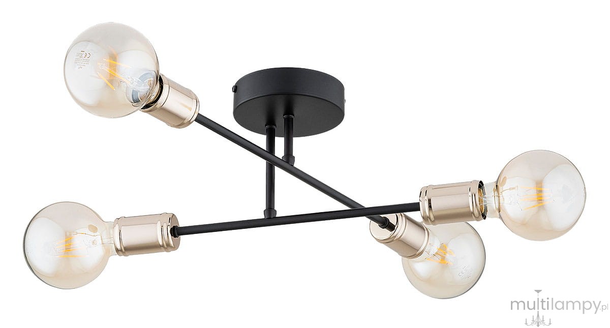 Czarna lampa sufitowa Estena z czterema oprawami E27 w kolorze starego złota. Ułożona w formie krzyżowej, z okrągłym, czarnym mocowaniem. Widoczne przezroczyste żarówki z widocznymi włóknami.
