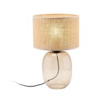 Lampa stołowa Melody z kloszem w kolorze bursztynowym na brązowej podstawie, wykonana z przezroczystego szkła. Ujęcie frontalne, widoczny kabel. Klosz z teksturylnym wykończeniem, okrągły kształt, średniej wielkości.