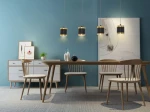 Lampa wisząca Toulouse 4xLED/34W w kolorze czarnym i złotym, zawieszona nad drewnianym stołem. W tle błękitna ściana, białe meble i dekoracje. Widać cztery lampy w różnych wysokościach, nadające elegancki wygląd aranżacji.