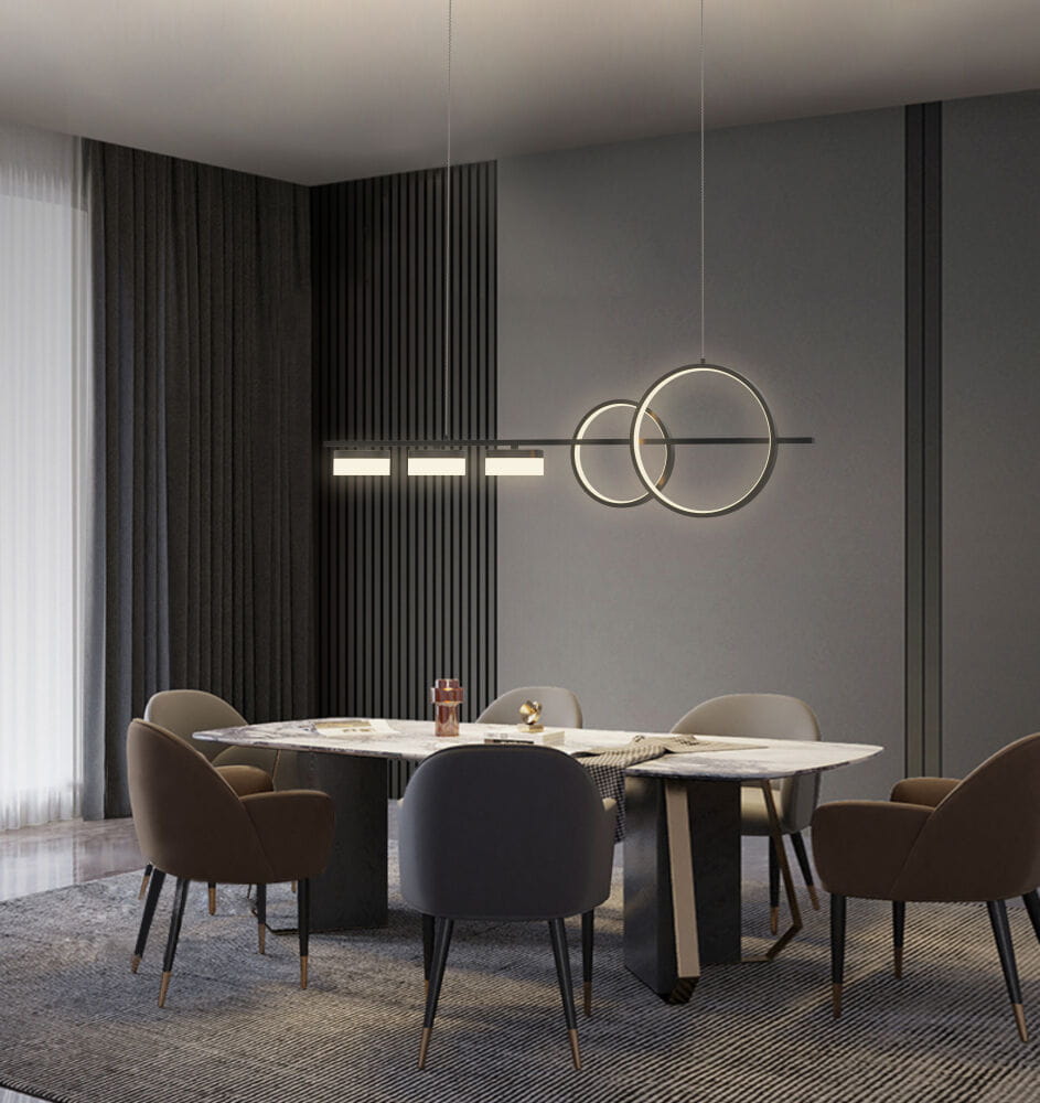 Lampa wisząca Messina w kolorze czarnym, z pięcioma źródłami LED o mocy 40W. Zawieszona nad okrągłym stołem, w nowoczesnym wnętrzu z szarymi panelami i eleganckimi krzesłami. Kształt lampy tworzy połączenie okręgów i prostokątów.
