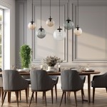 Lampa wisząca Esme z sześcioma oprawami E27 w kolorze czarnym i multikolorowymi kloszami, zawieszona nad okrągłym stołem w eleganckiej jadalni. Klosze w różnych odcieniach szarości i beżu, z czarnymi elementami mocującymi.