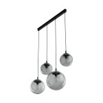 Lampa wisząca Esme 4xE27 w kolorze czarnym i grafitowym, z czterema szklanymi kloszami w formie kul, zwisającymi na czarnych przewodach z metalowym mocowaniem. Klosze mają przezroczyste, lekko przyciemnione szkło, eksponujące źródła światła.