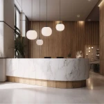 Lampa wisząca Vibe D25 w kolorze czarnym i białym, z jednym gniazdem E27. Widoczna w nowoczesnym wnętrzu, zawieszona nad białym blatem recepcyjnym, z delikatnymi, okrągłymi kloszami, w otoczeniu drewnianych elementów i roślin.