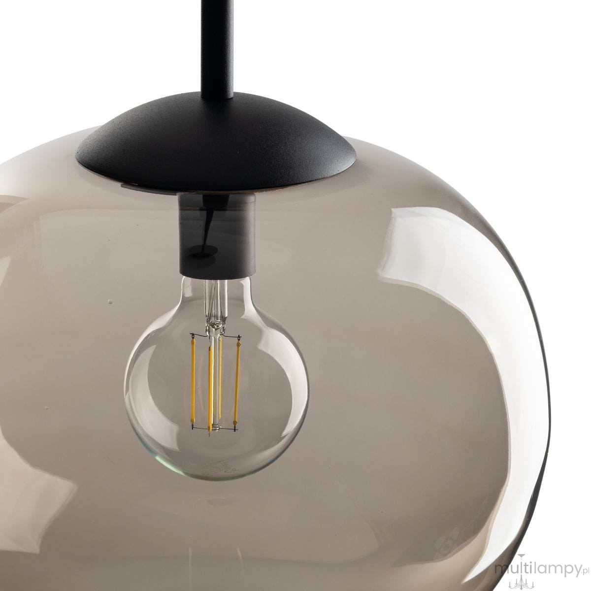 Lampa wisząca Vibe D20 z czarnym stelażem i topazowym kloszem. Widoczna żarówka E27 z widocznymi ciepłymi włóknami. Klosz okrągły, półprzezroczysty, z gładką powierzchnią, zawieszony na cienkim przewodzie.