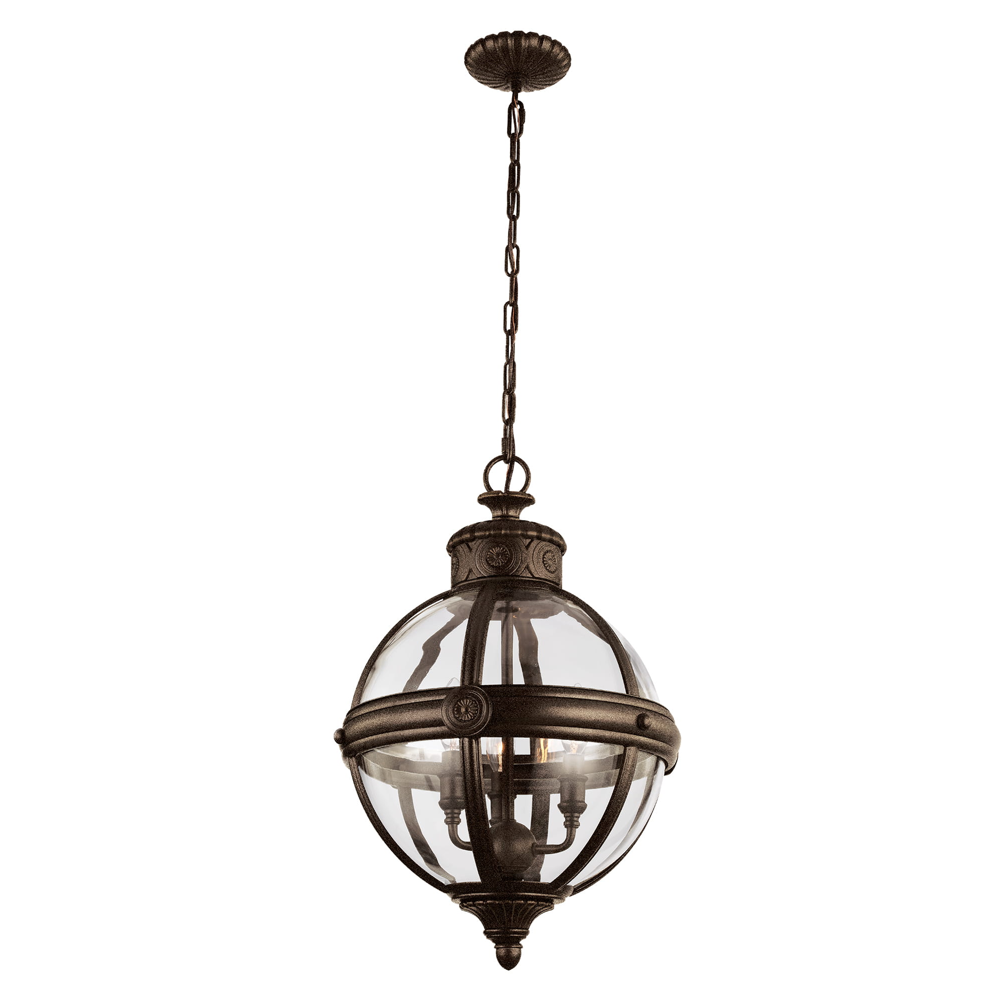 Lampa wisząca Adams w antycznym brązie z przezroczystym kloszem, zawieszona na łańcuchu. Owalna forma z dekoracyjnymi elementami, z miejscem na trzy żarówki E14. Wisi w centralnej pozycji, na białym tle.
