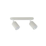 Beżowa lampa sufitowa typu spot z dwoma oprawami na żarówki GU10. Utrzymana w minimalistycznym stylu, montowana na prostokątnej podstawie. Widać dwa cylindryczne klosze skierowane w różne strony, z białymi detalami mocującymi.