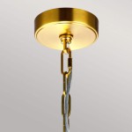 Lampa wisząca Nico XL z okrągłym, oksydowanym mosiężnym mocowaniem. Zawieszenie na metalowym łańcuchu z przezroczystym kablem. Prosty, elegancki design, idealna do nowoczesnych wnętrz.