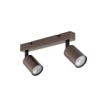 Brązowa lampa sufitowa typu spot z dwoma ruchomymi oprawami na żarówki GU10. Ujęcie frontalne, produkt zamontowany na płaskiej podstawie z metalicznym wykończeniem. Wysokie, cylindryczne klosze z przezroczystymi szybami, idealne do oświetlenia wnętrz.