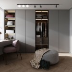 Lampa sufitowa Vox z trzema źródłami światła GU10 i G9 w czarnej obudowie, zamontowana na metalowej listwie. Oświetlenie w nowoczesnym wnętrzu z szarymi szafkami i drewnianą podłogą, w otoczeniu mebli i akcesoriów.