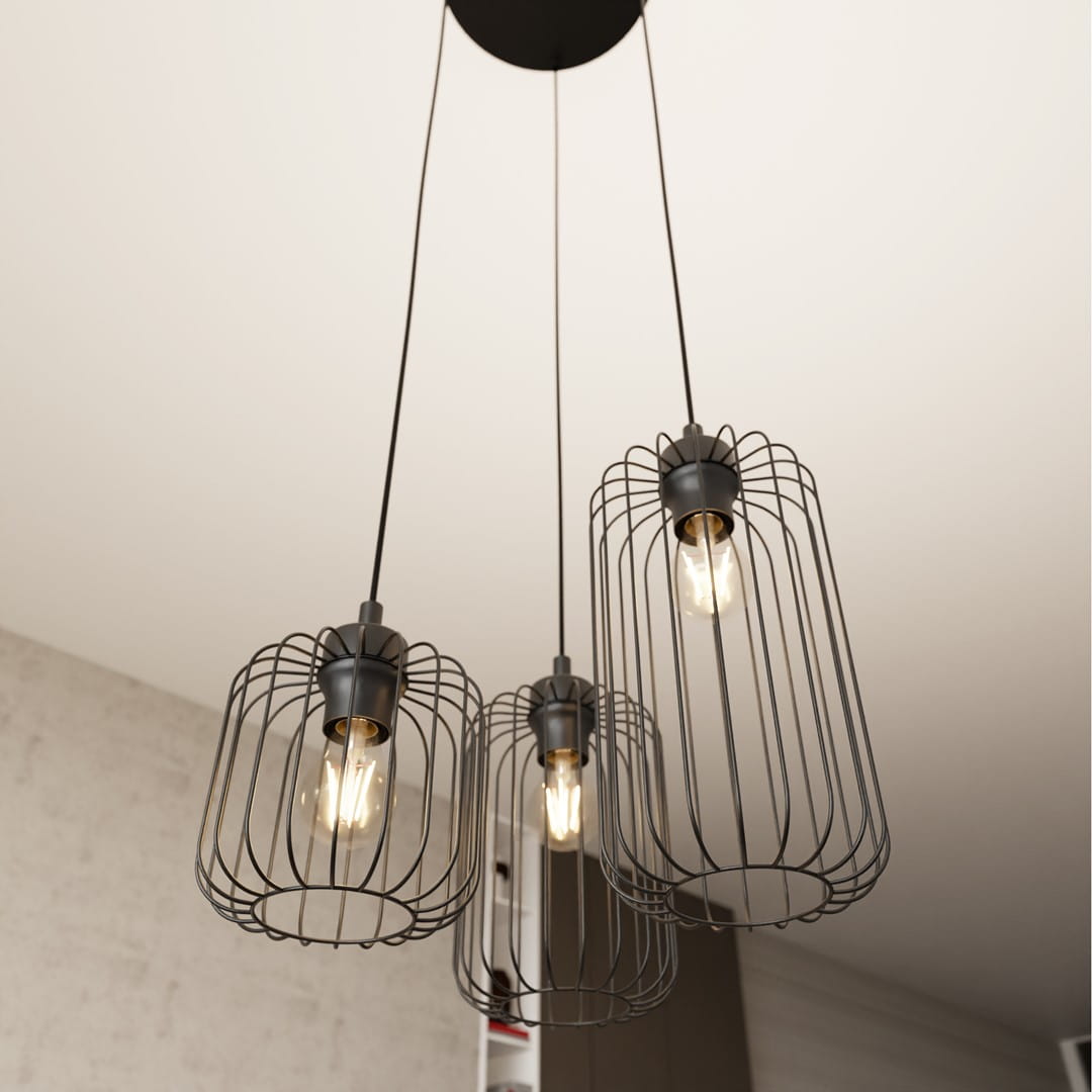 Lampa wisząca Vander w czarnym kolorze z trzema kloszami z metalowej siatki. Ujęcie z dołu, prezentujące wszystkie trzy źródła światła E27 zawieszone na długich przewodach. Klosze mają cylindryczny kształt, a ich struktura jest lekko przezroczysta.