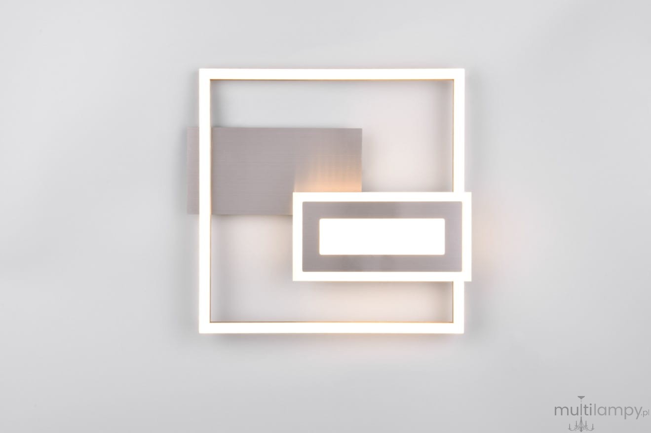 Lampa sufitowa Spiro w kolorze niklowym, z dwoma źródłami LED o mocy 22W. Posiada nowoczesny, geometryczny kształt z elementami w formie prostokątów, oświetlająca przy użyciu ciepłego światła. Montowana na ścianie lub suficie.