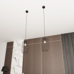 Czarna lampa wisząca Vander 1BL z metalową kloszem w formie siatki, zawieszona na długich przewodach. Widoczne jednolity sufit oraz drewniane panele w tle. Lampa przeznaczona do żarówki E27.